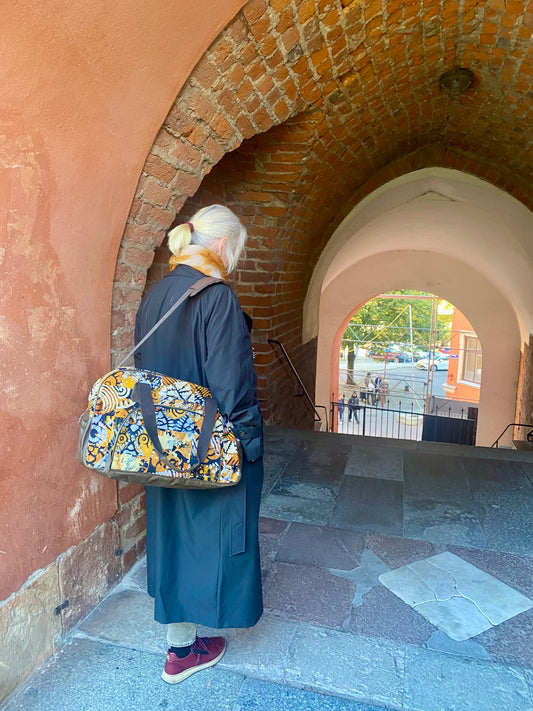 Weekendväska kitenge läder orangegrå